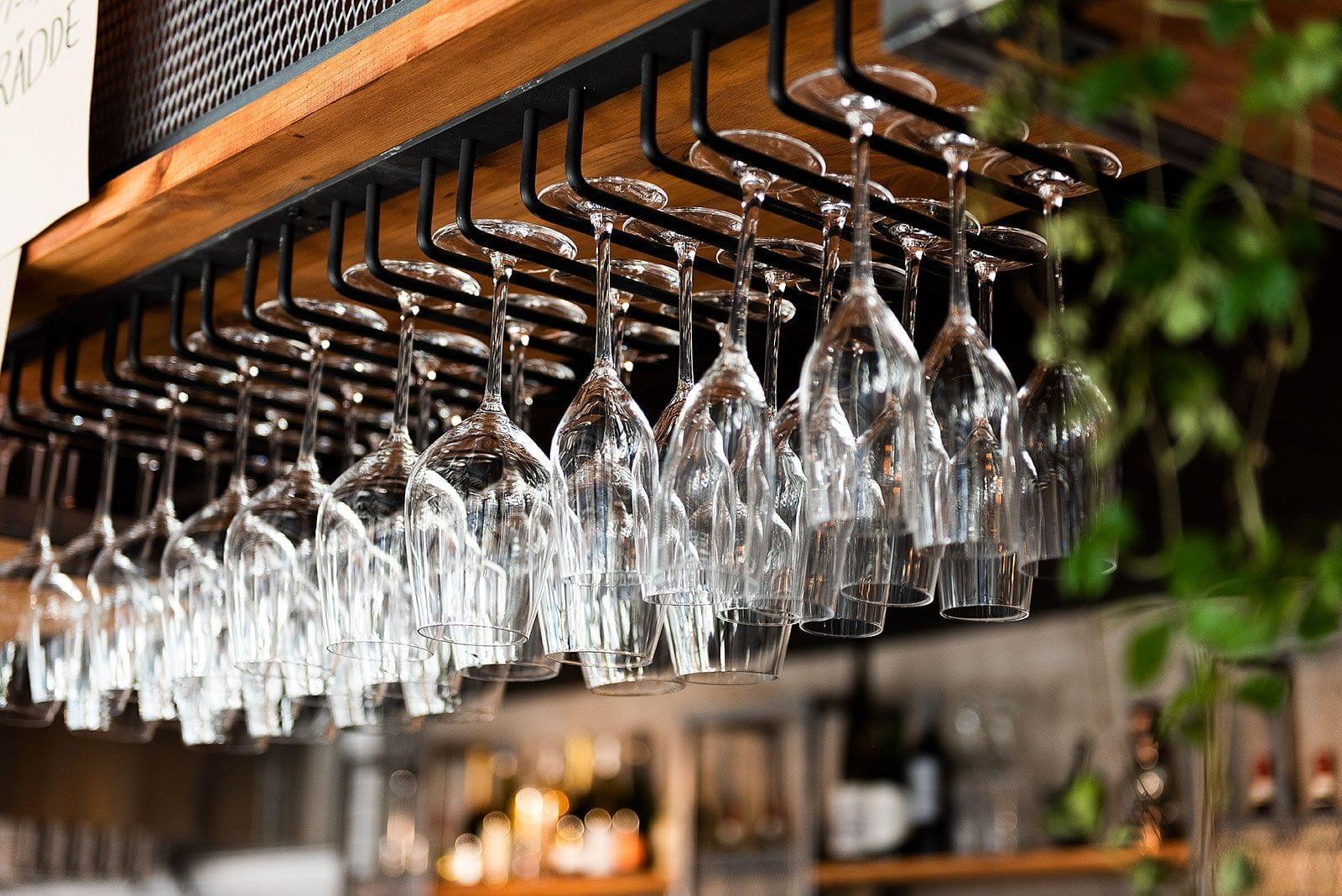 Glasses hanging in the bar ceiling