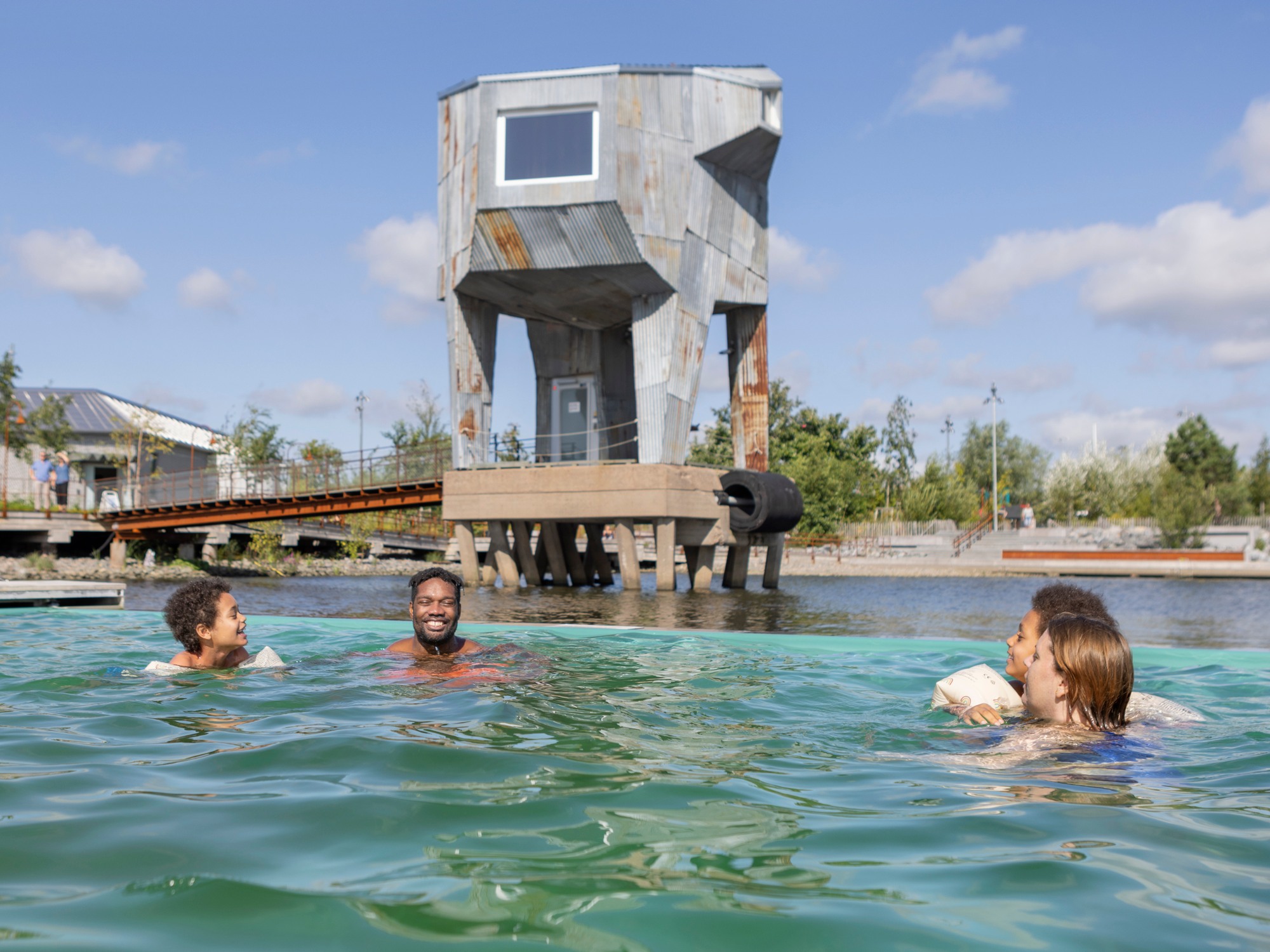 Four people swim in the park Jubileumsparken.