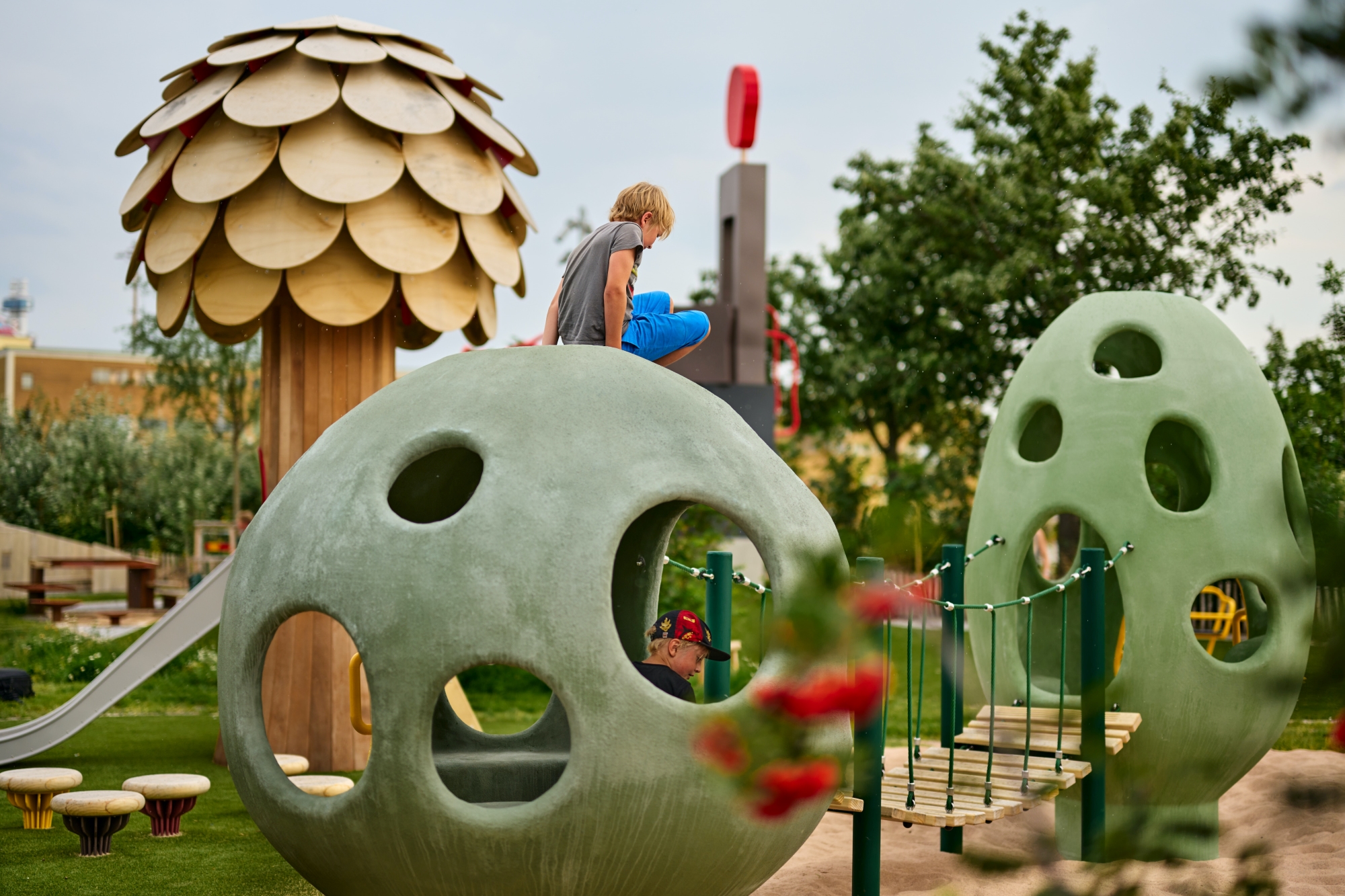 Two kids at the playground in the park Jubileumsparken.